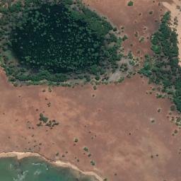 Satellite imagery of Ainag Point, AU