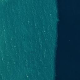 Satellite imagery of Ainag Point, AU