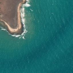 Satellite imagery of Ainag Point, AU