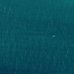 Satellite imagery of Ainag Point, AU