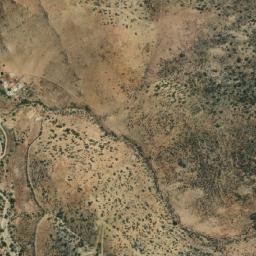 Satellite imagery of Cuatro Amigos, CL