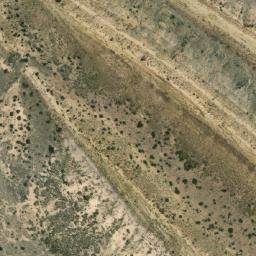 Satellite imagery of Loma Puesto Baraona, AR