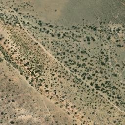 Satellite imagery of Loma Puesto Baraona, AR