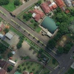 Sand Volleyball Court in Muara Bulian, JA — aerial view